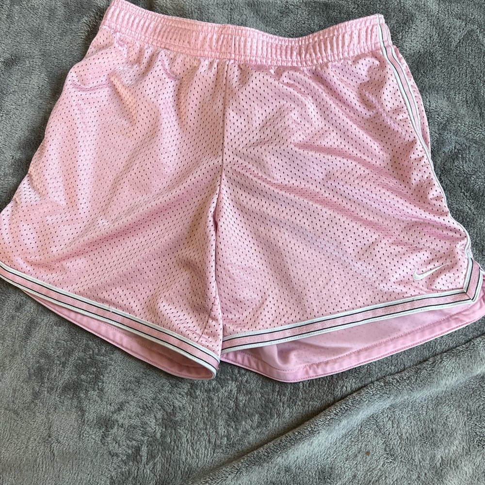 Nike basketball shorts, Size XL but fit like a M